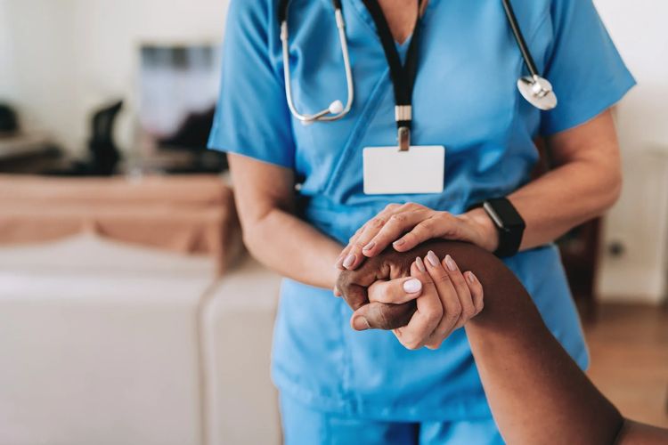 Compassionate healthcare professional with patient